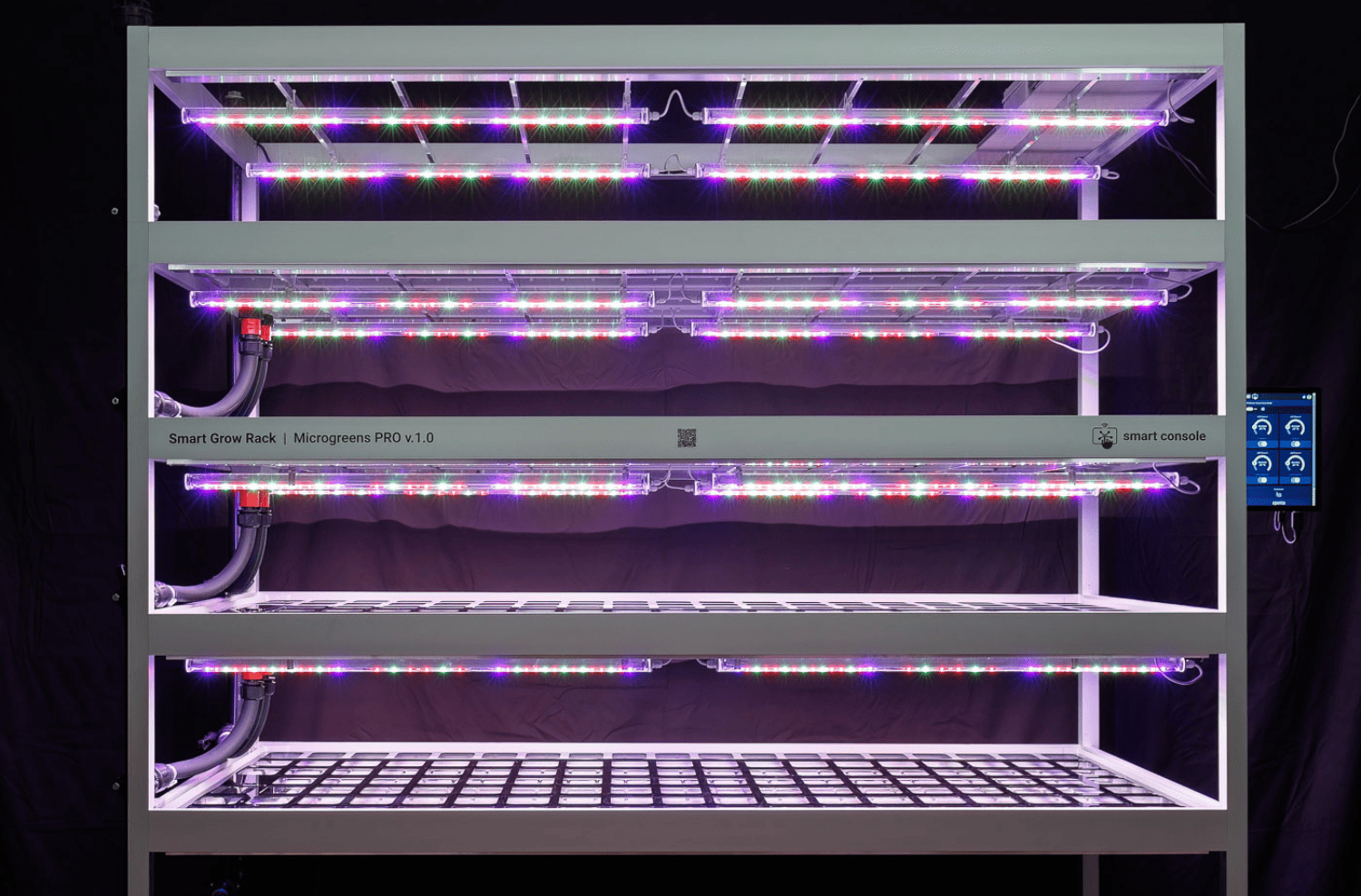 Vertical farm shelves with LED grow lights by Ambralight for optimal hydroponic system farming.